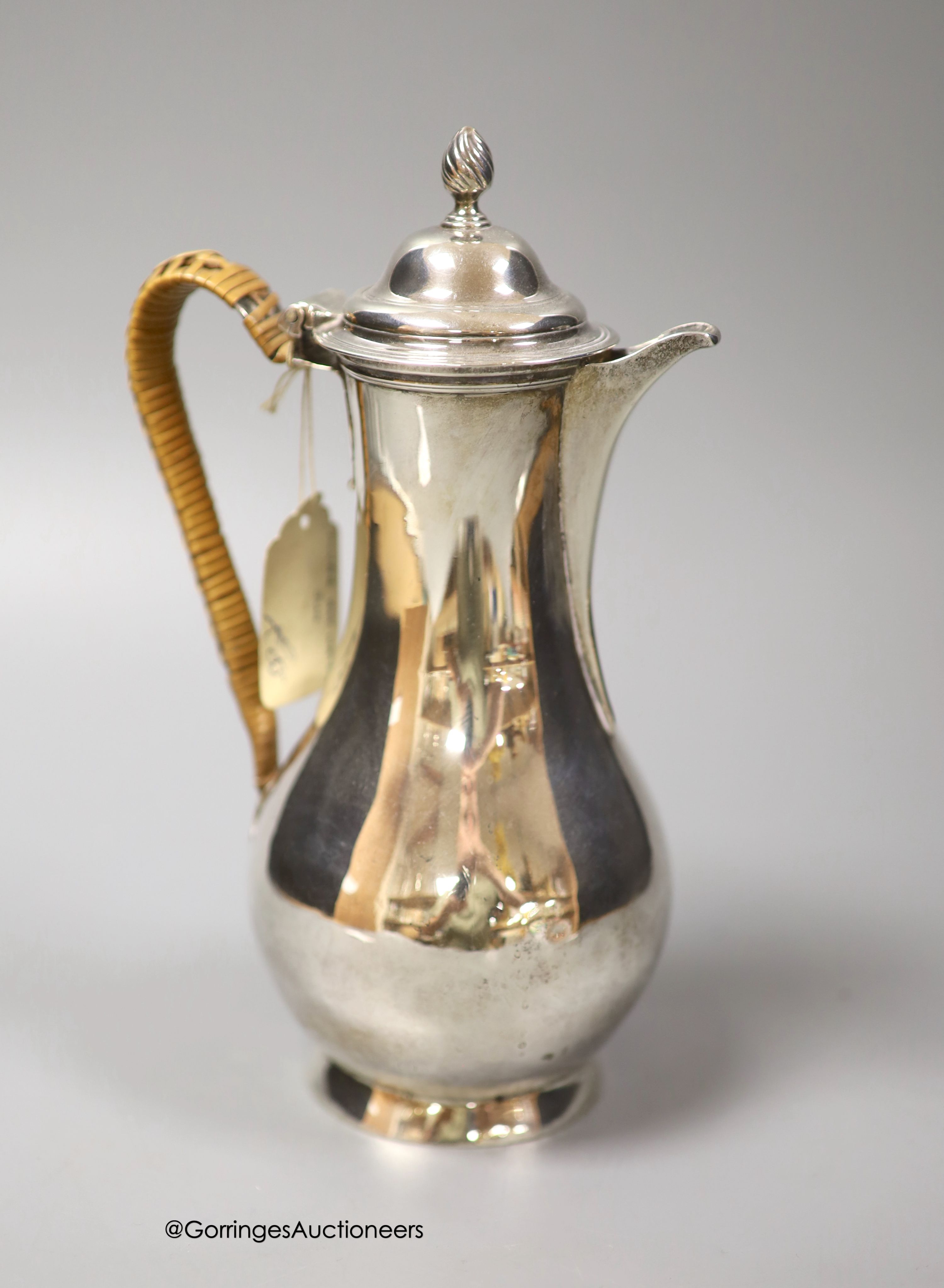 A George III silver baluster hot water pot, Charles Wright, London, 1771, height 21.7cm, gross weight 11.5oz